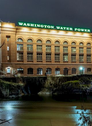 A night view of a brick building with 